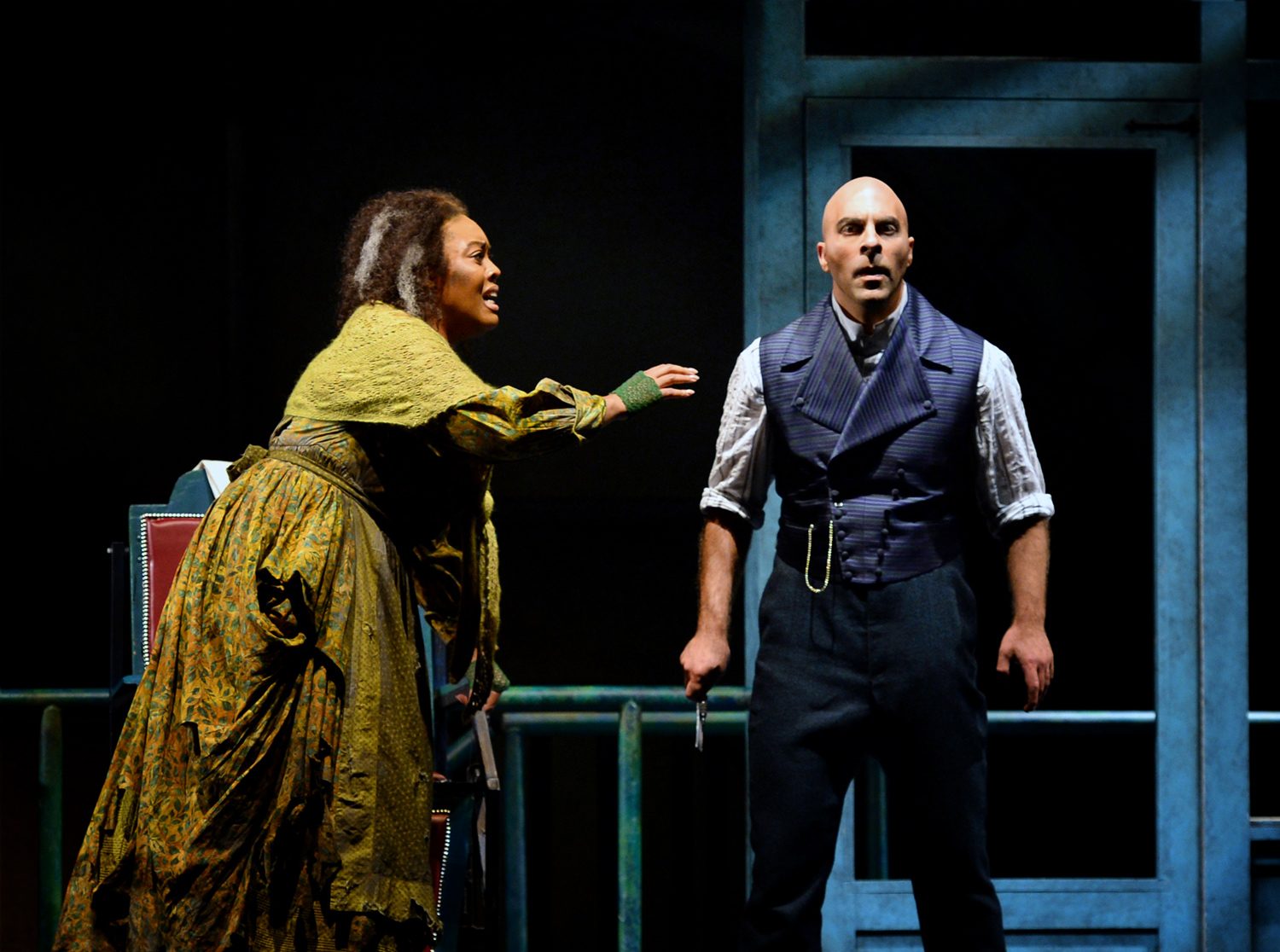 Zoie Reams as the Beggar Woman and Zachary Nelson as Sweeney Todd