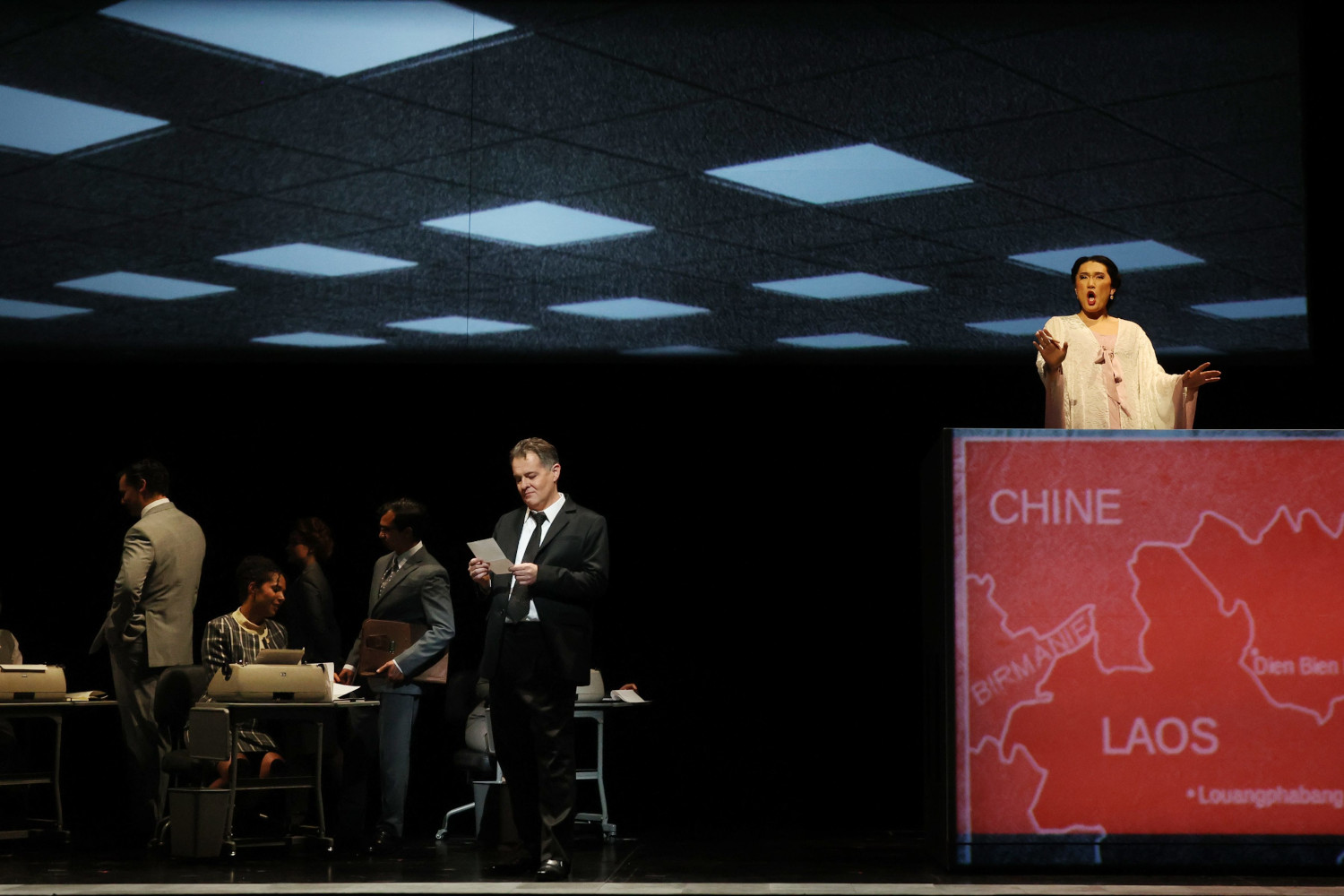 Left-Right; Ensemble, Mark Stone (René Gallimard), Kangmin Justin Kim (Song Liling), photo by Curtis Brown for the Santa Fe Opera